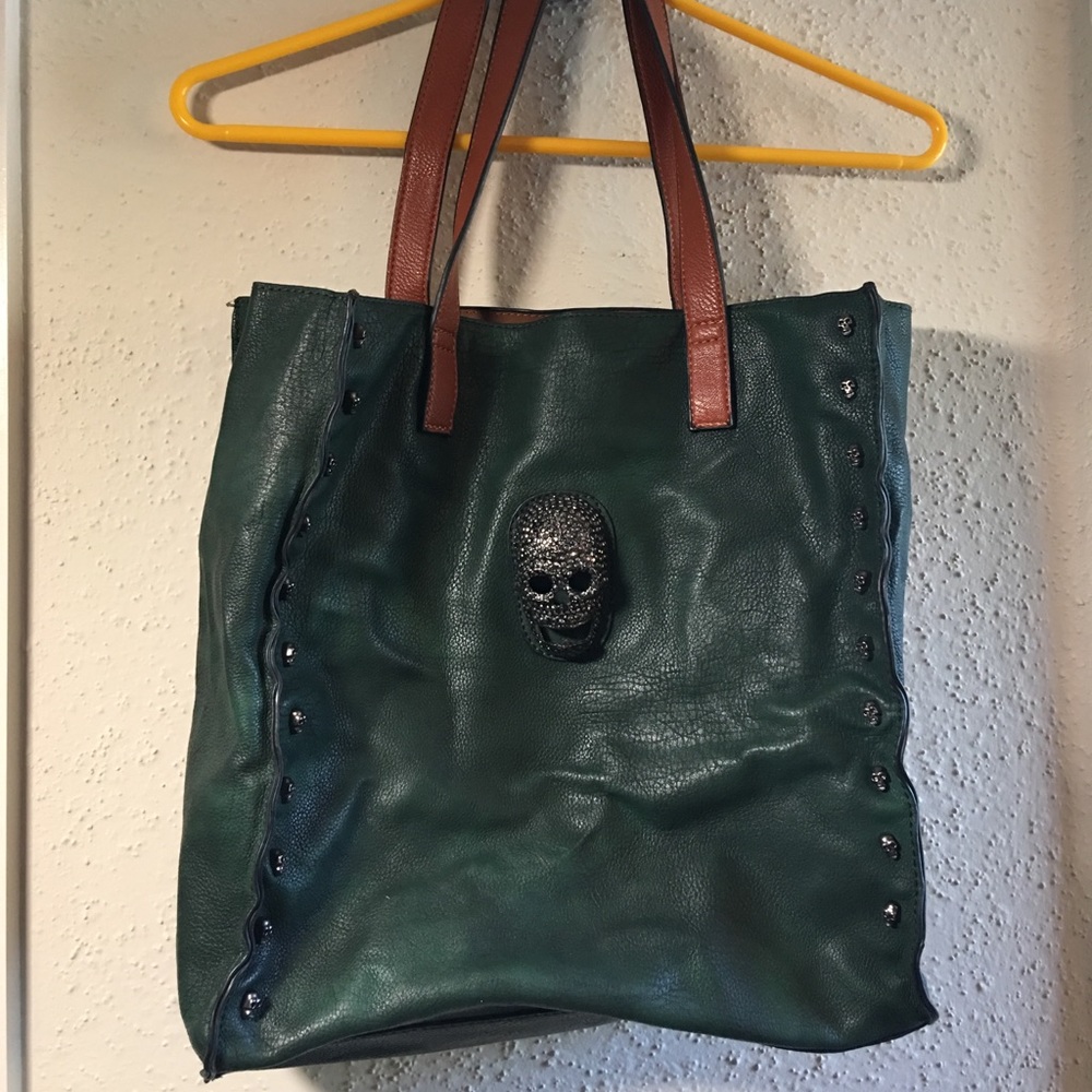 Green leather bag with skull